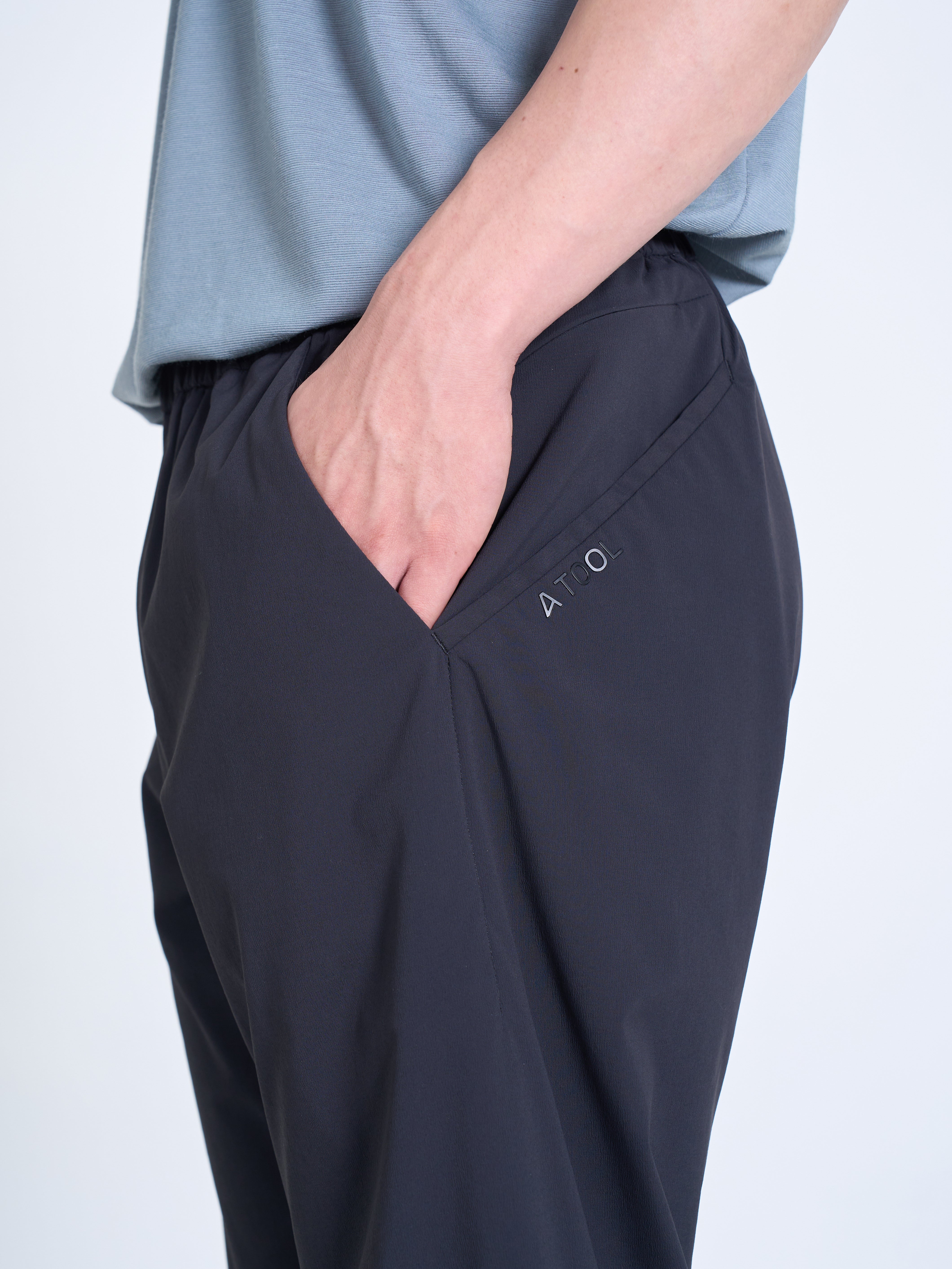 INTUITIVE FLUID TRACK PANTS BL