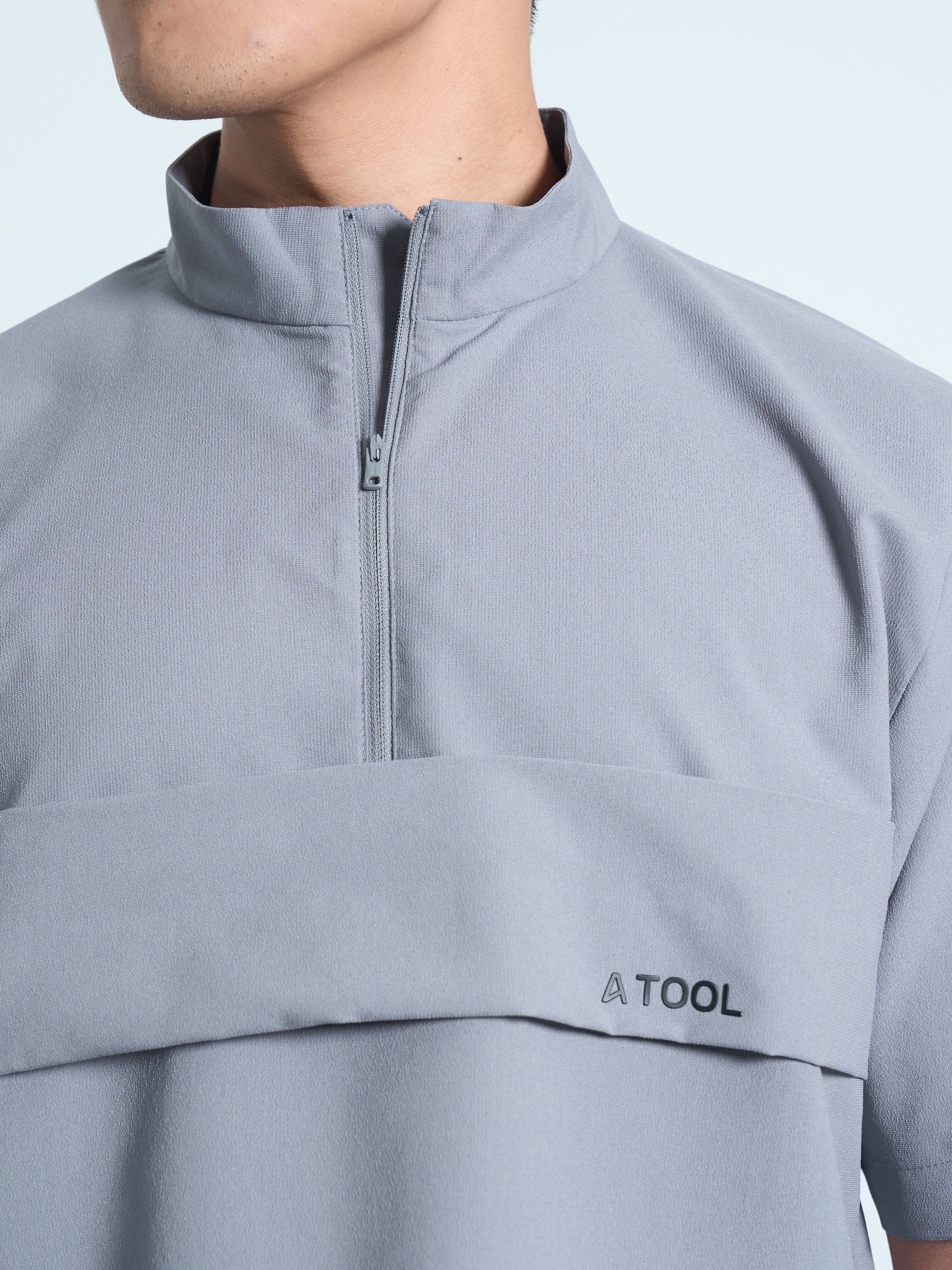 SHORT-SLEEVE QUARTER ZIP FG