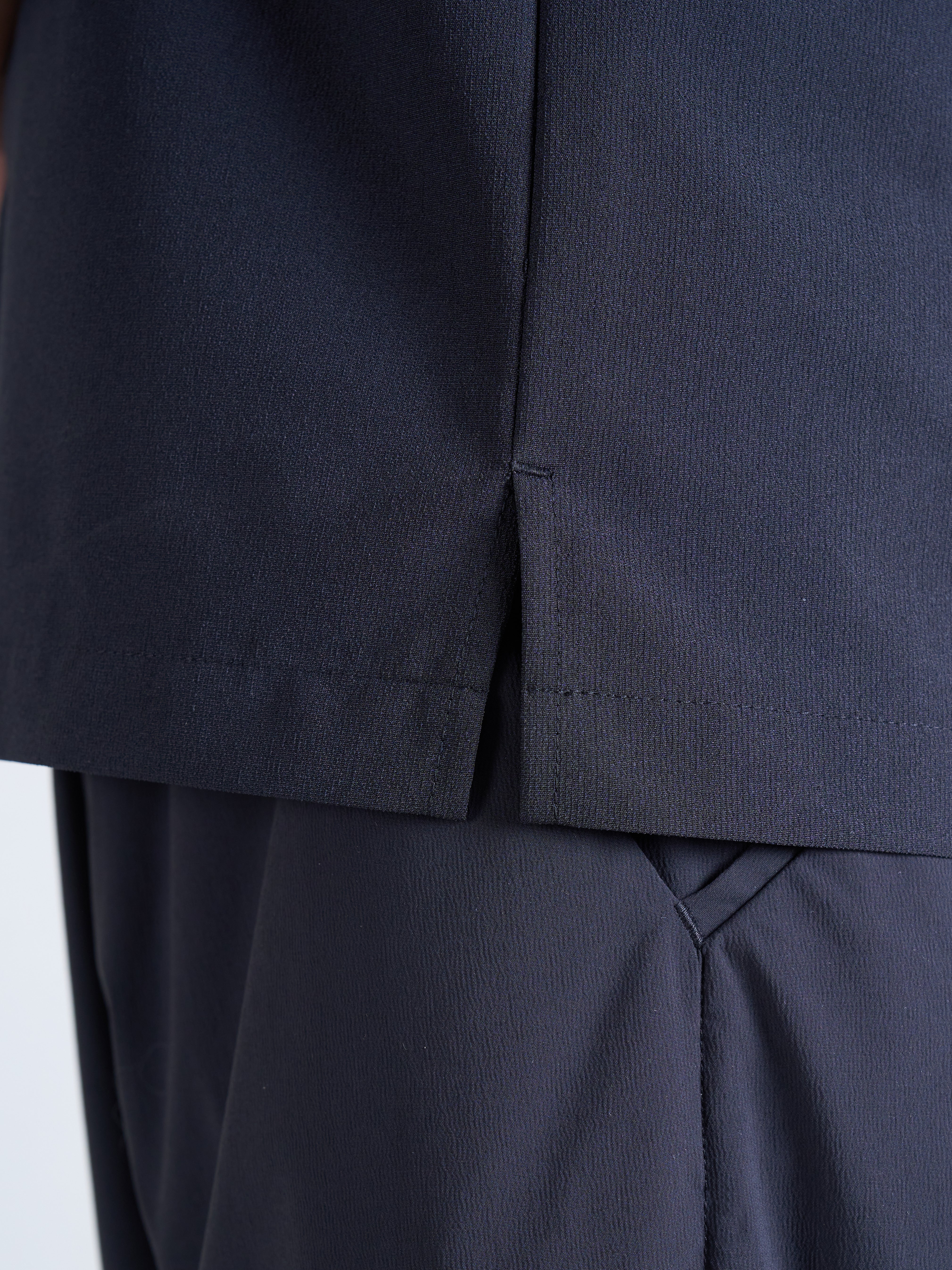 SHORT-SLEEVE QUARTER ZIP BL