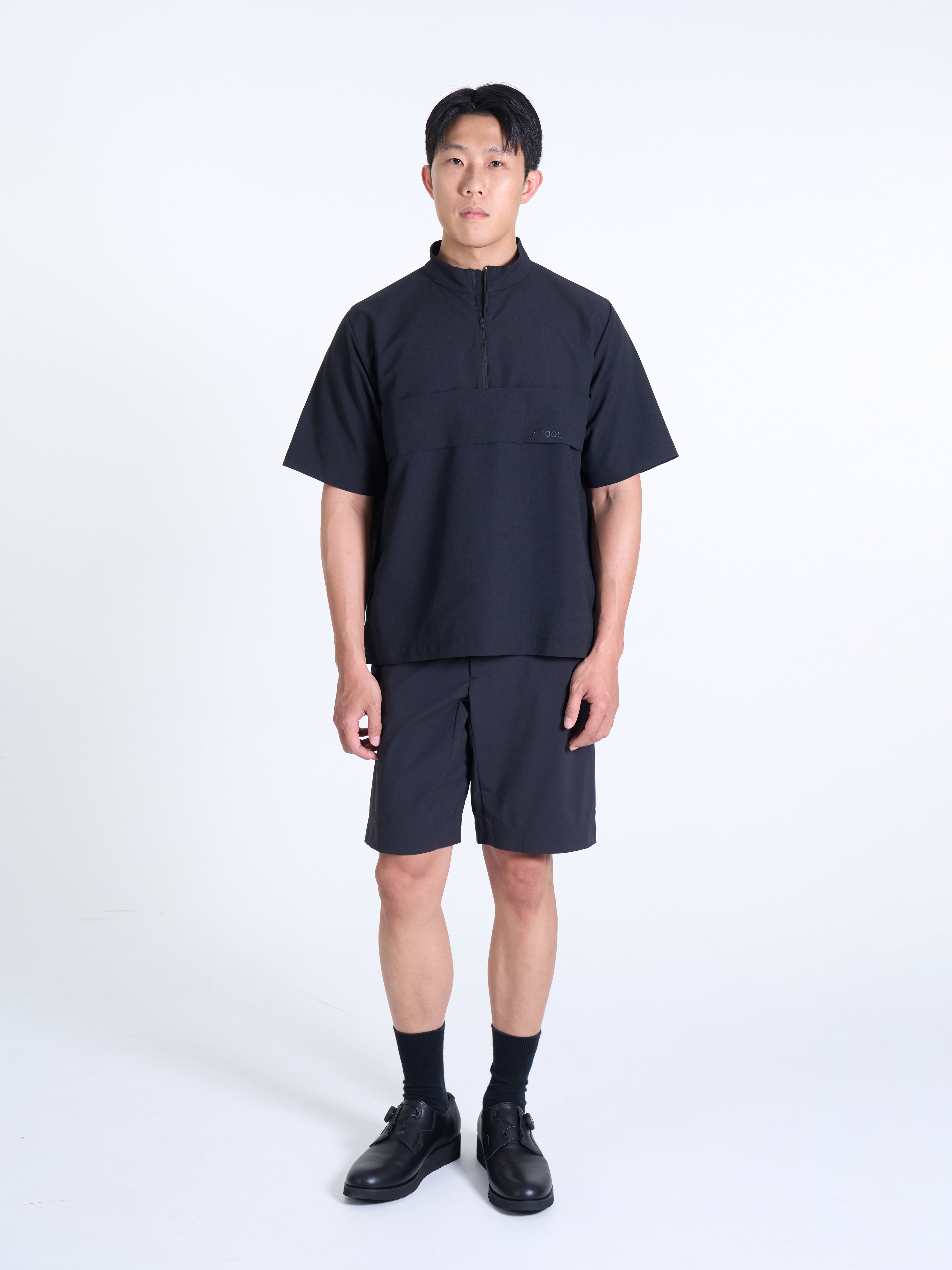 SHORT-SLEEVE QUARTER ZIP BL